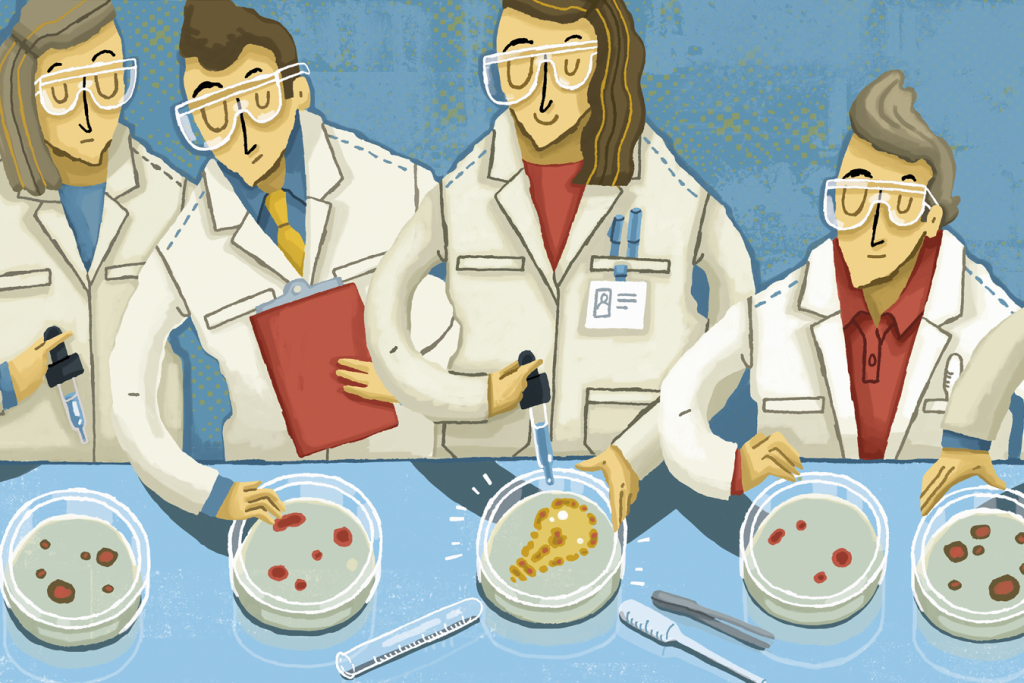 Four scientists in white lab coats with petri dishes