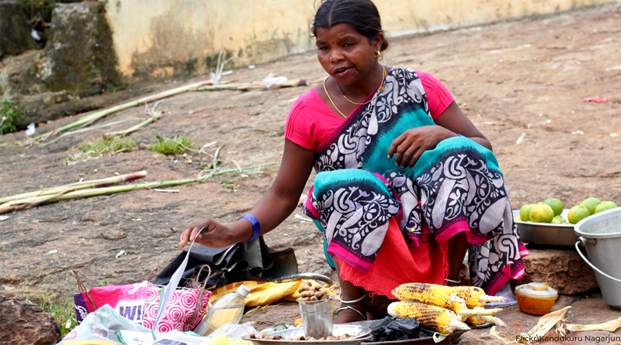 Butta girl with bamboo chicken at Araku Valley. Andhra Pradesh