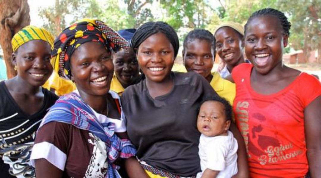 Nine women and an infant from sub-Saharan Africa   