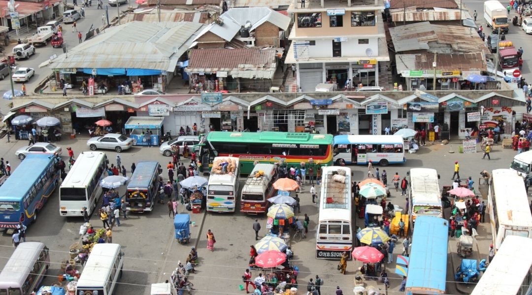 Busses and taxis fill a transportation hub in Kenya