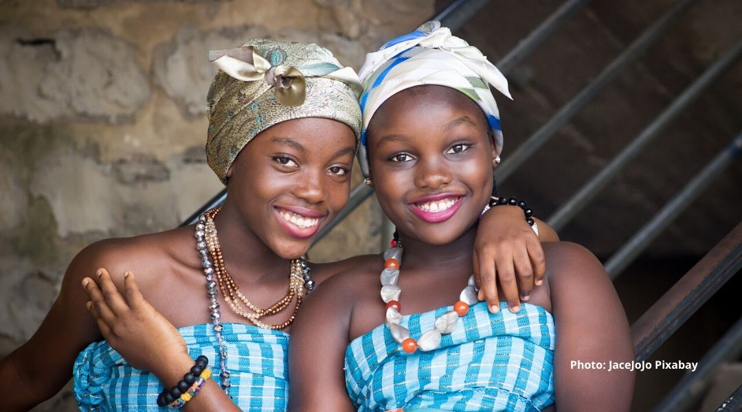 Two adolescent girls in traditional South African attire