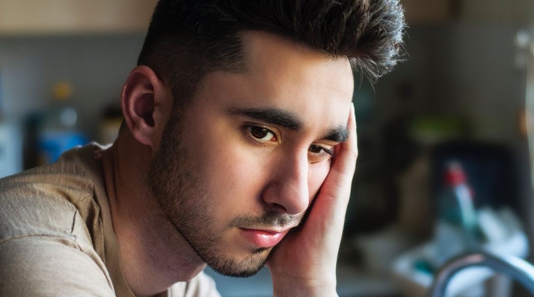 A young man looking worried