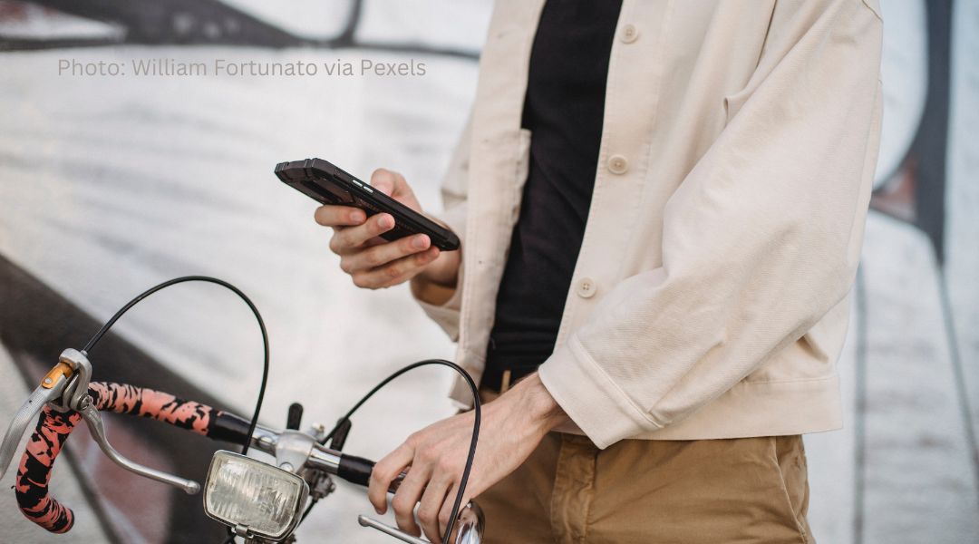 A. young man stares at his smart phone